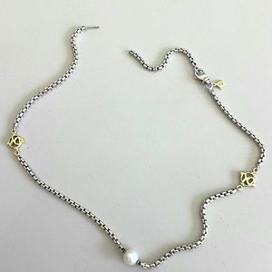 David Yurman SS 18kt Gold pearl necklace 15 1/2”, please note that it’s broken.